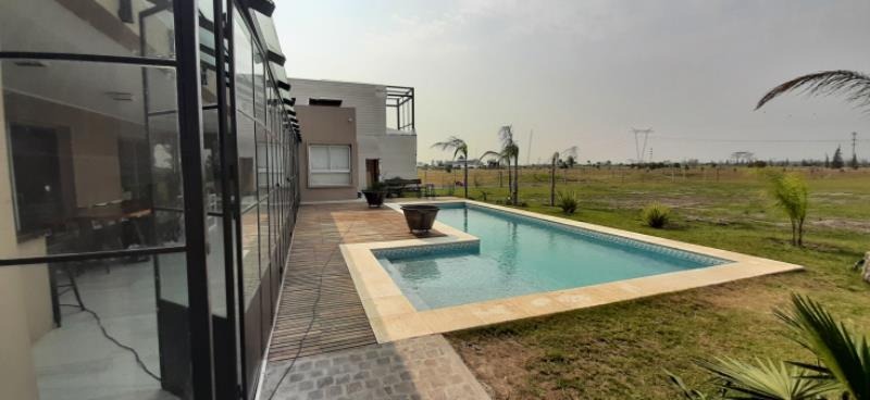 RESIDENCIA GV - CHACRAS DEL GOLF- CTES - Bury Mayer Estudio de Arquitectura